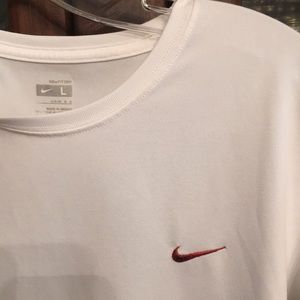 NIKE round neck/Lg. unisex. Short sleeve allwhite tee,w/Burgandy swish ensignia.